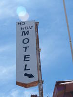 Sign for “Ho Hum Motel”