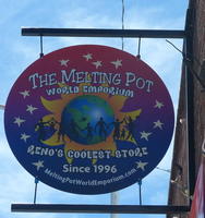 Sign for “The Melting Pot / World Emporium / Reno's coolest store since 1996”