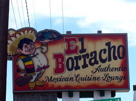 Drunk Mexican in sombrero: sign at “El Borracho” restaurant