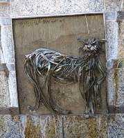 Metal sculpture of a wild cat