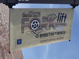 Stylized Fork and gear wheel in logo for Forklift restaurant at UNR.