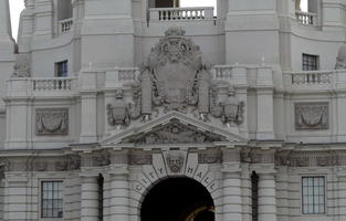 Closeup of entrance archway to City Hall with reliefwork