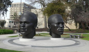 large busts of Jackie and Mack Robinson (African-American athletes)