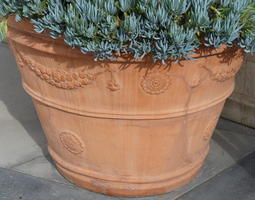 Terra cotta planter with greek motif