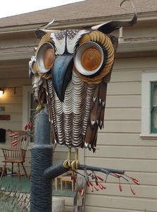 Owl with yellow signal lights as eyes