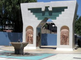 Gateway at San Jose State University carved in form of United Farm Workers symbol, painted with farmworkers and Cesar Chavez.
