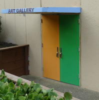 Green and yellow door to art gallery