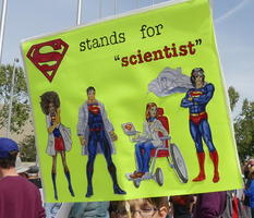 S (superman symbol) stands for “scientist”