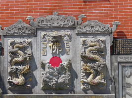 dragon carving with sun