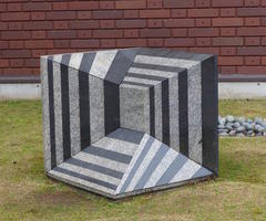 Striped cube that has an optical illusion effect; in front of Museum of Contemporary Art.