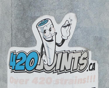Cartoon marijuana cigarette. Text: 420joints.ca / Over 420 strains!