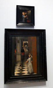 Above: painting of boy holding a torch. Below: Girl with head turned toward viewer, playing with a small dog