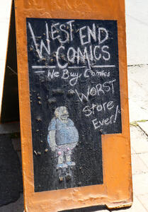 west end comics sign