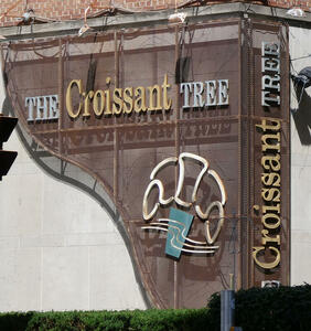 croissant tree sign