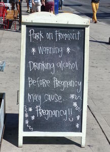 Sign in front of restaurant: *Warning* Drinking alcohol before pregnancy may cuase...pregnancy!!"