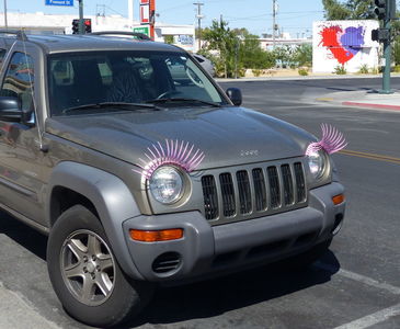 Jeep with purple “eyelashes” on headlights