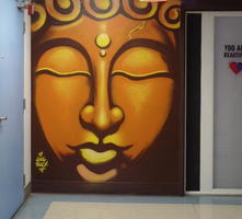 Buddha face painted on wall