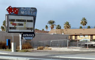 Hotel sign at empty lot