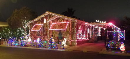 Over-decorated house with christmas ornaments at night