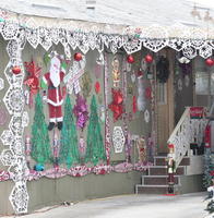 Over-decorated house with christmas ornaments at night