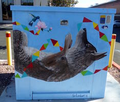 Utility box with coyote and hummingbird.