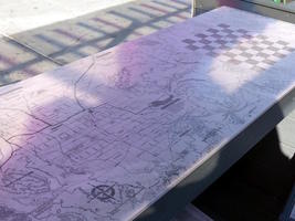 Stone table with checkerboard and map of Las Vegas