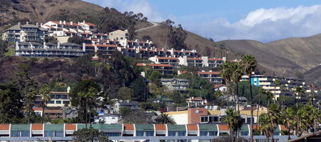 Rows of houses and apartment buildings on hillside