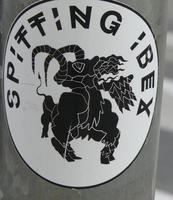 Sticker with text: Spitting Ibex and somewhat abstract picture of a spitting ibex
