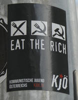 Sticker with three small panels showing a knife and fork turning into a hammer and sickle. Text: EAT THE RICH