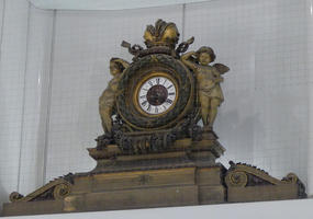 Old-style clock with cherubim at Franz Joseph train station