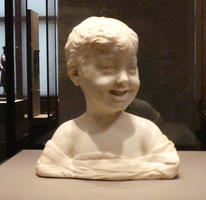 15th century bust of laughing boy