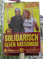 Woman in hijab and woman in T-shirt. Text: In solidarity against racism.