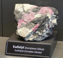 pink, white, and gray sample of eudialyte
