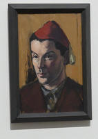 Portrait of man wearing red nightcap