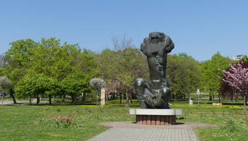 Sculpture in public park; shaped like a large fist