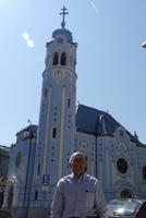 Me standing in front of the Blue Church