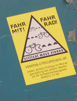 Sticker for Critical Mass Vienna, showing a bicycle eating cars like Pacman