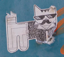 Sticker of cat with moustache, glasses and coat and tie