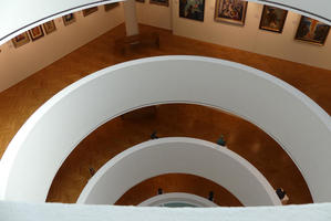 View down circular stairwell of gallery