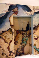 Elevator painting with man and woman peasant on arid land, mountain in background