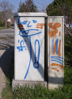 Electrical box with graffiti line drawing of man with tongue sticking out