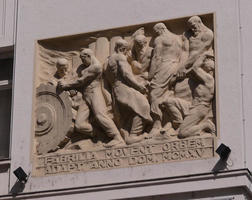 Relief sculpture of workers