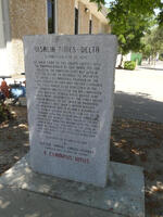 Large stone marker detailing history of Visalia Times-Delta