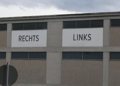 Building with signs Rechts on left and Links on right.