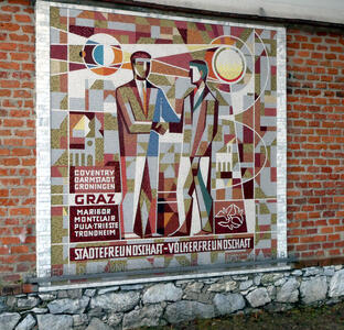 Mosaic of two men shaking hands