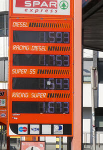 Gas price sign with range from 1,593 for diesel to 1,673 for Racing Super