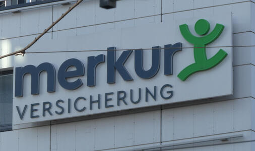 merkur versicherung with stylized green dancing man logo.