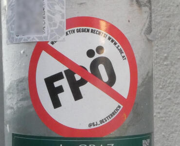 Circular sticker in form of “no entry“ sign with text FPÖ