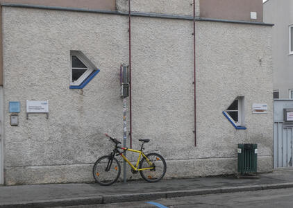 wall with triangular windows