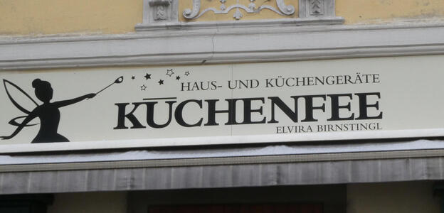 word Küchenfee with a long line to represent the umlaut.